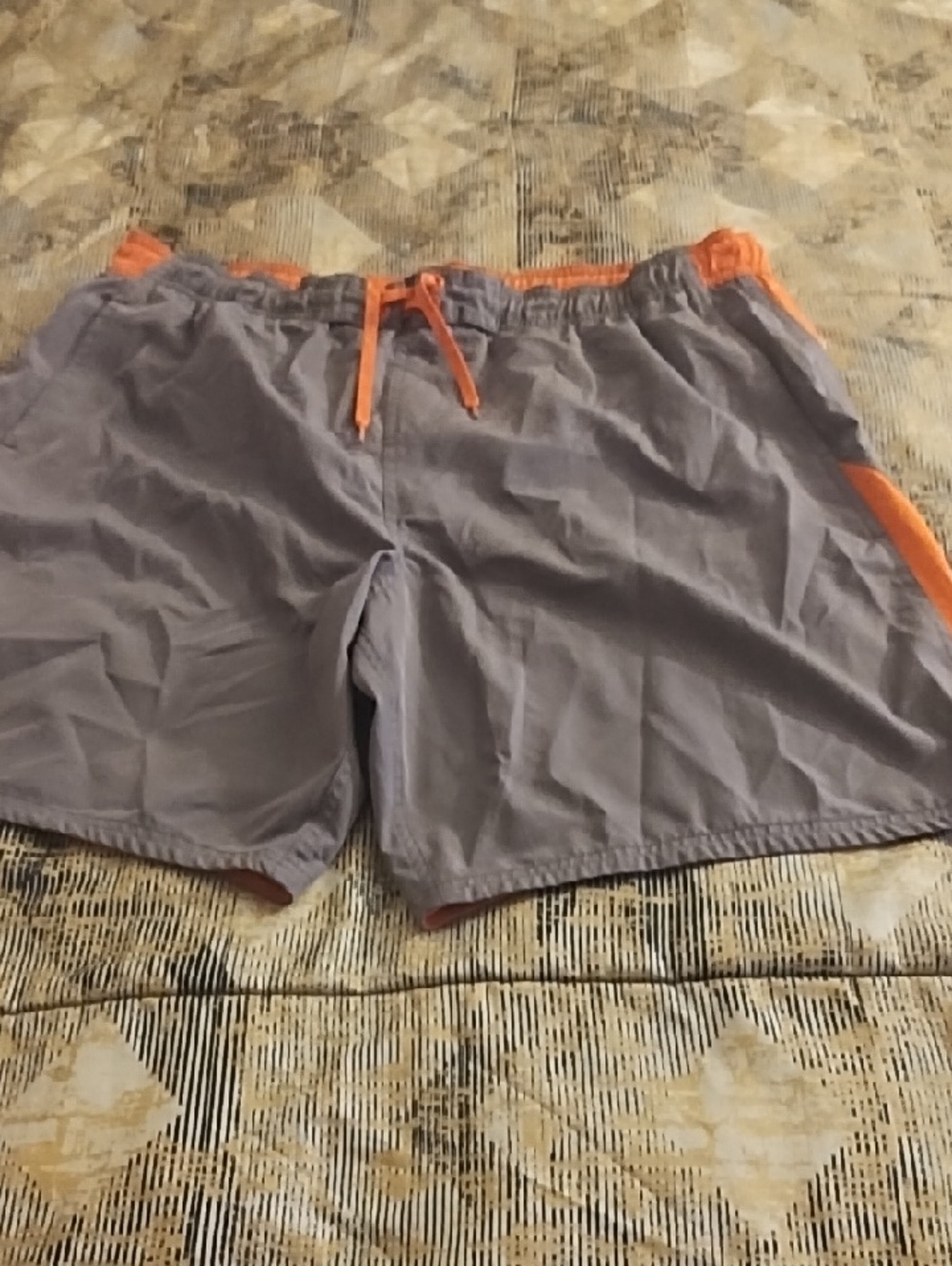 Nike Men's Gray Swim Trunks with Orange Accents